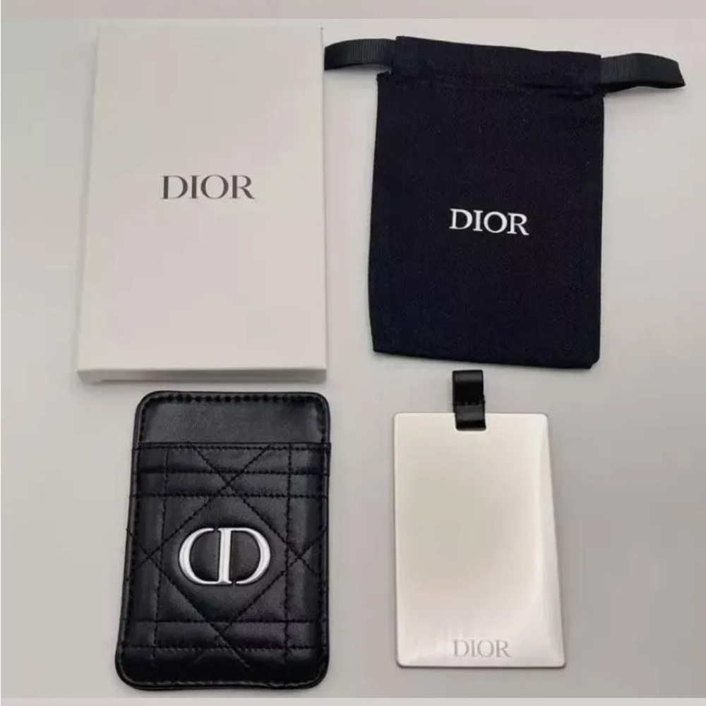 Very nice Dior mirror and holder fits mirror and one card or to cards new in box